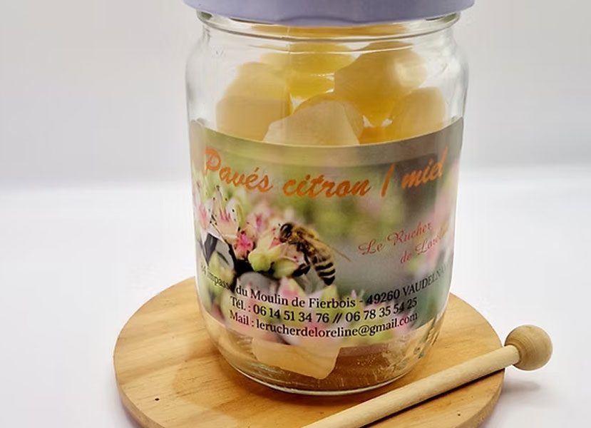 Jar filled with honey candies.